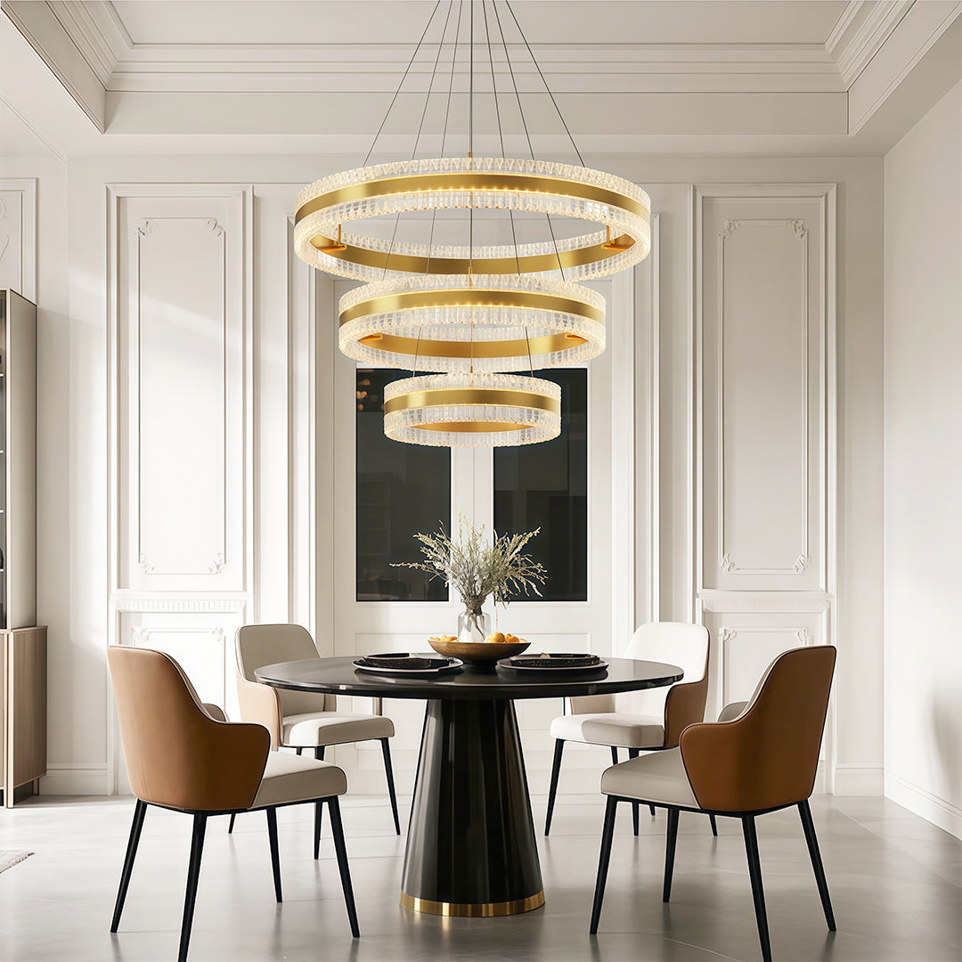 Modern circular chandelier with a crystal-embedded design, adding luxury to a dining room.