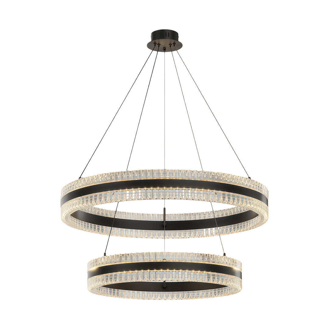 Modern circular chandelier with a gold finish, hanging in a contemporary dining area.