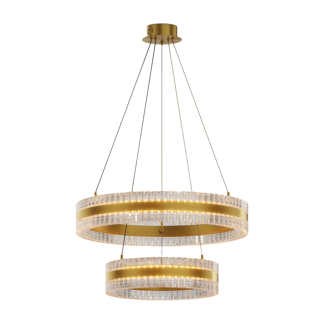 Modern circular chandelier with a silver finish, suspended above a dining table.