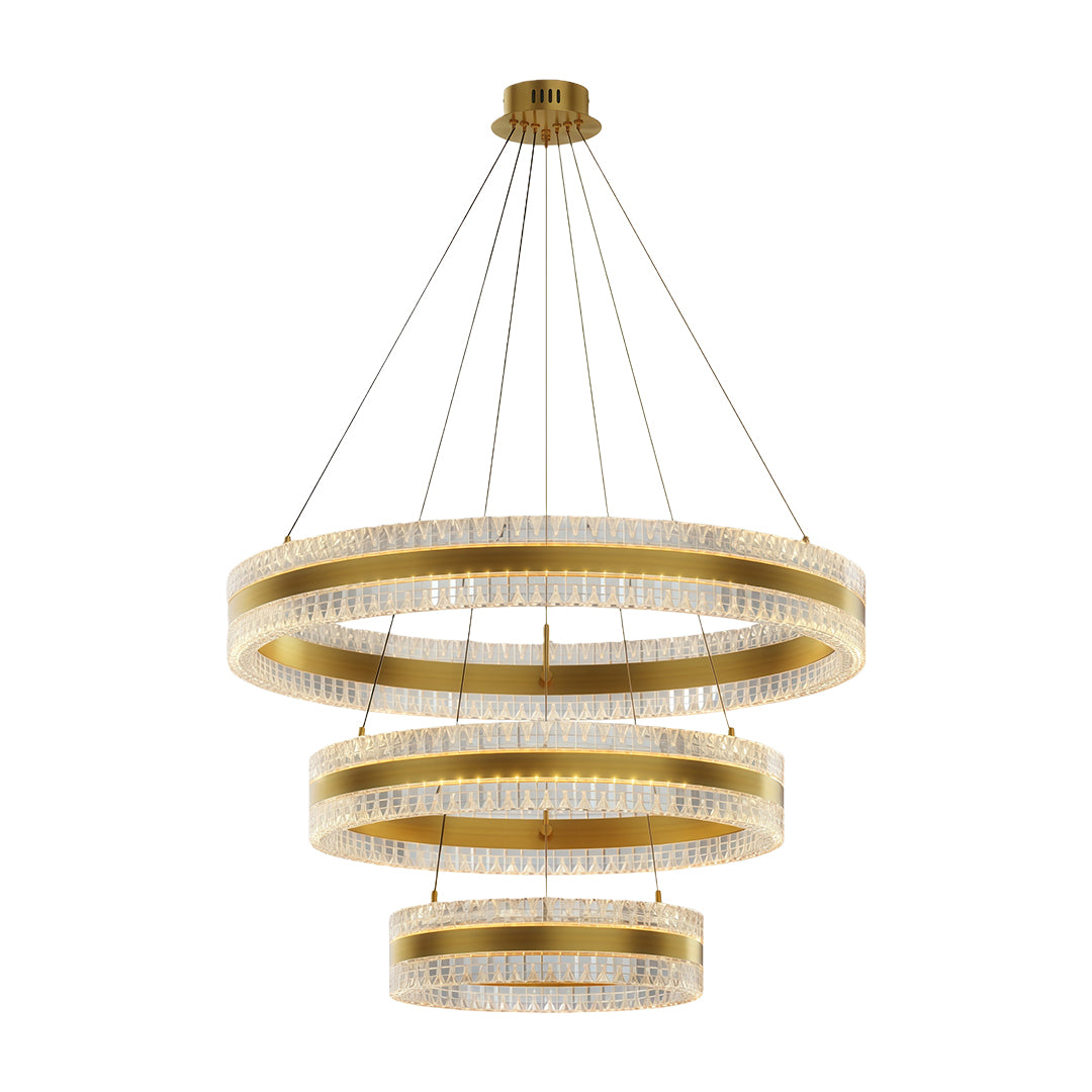 Modern circular chandelier with triple rings, adding a luxurious touch to a dining space.