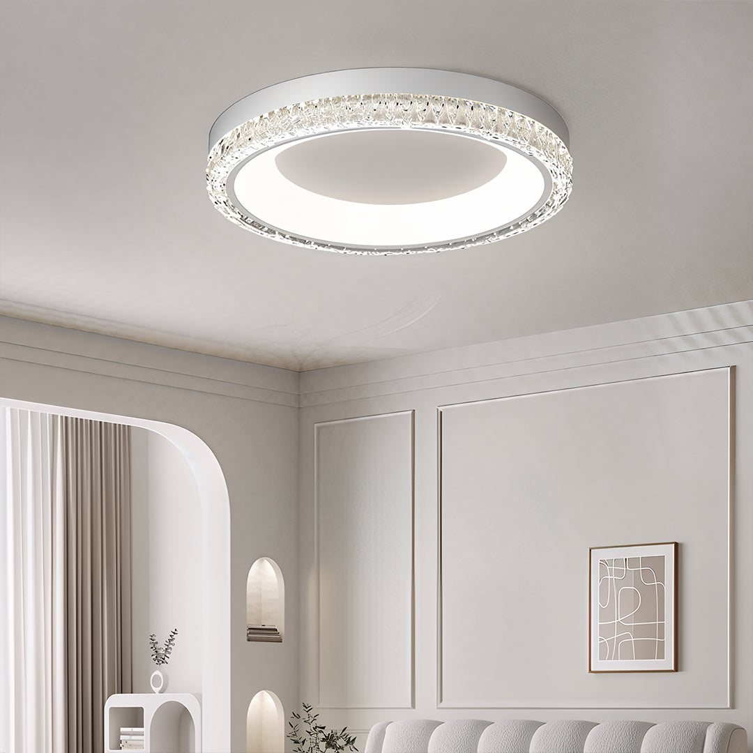 Modern circular white flush mount ceiling light fixture designed for high-efficiency lighting in hallways and entryways.
