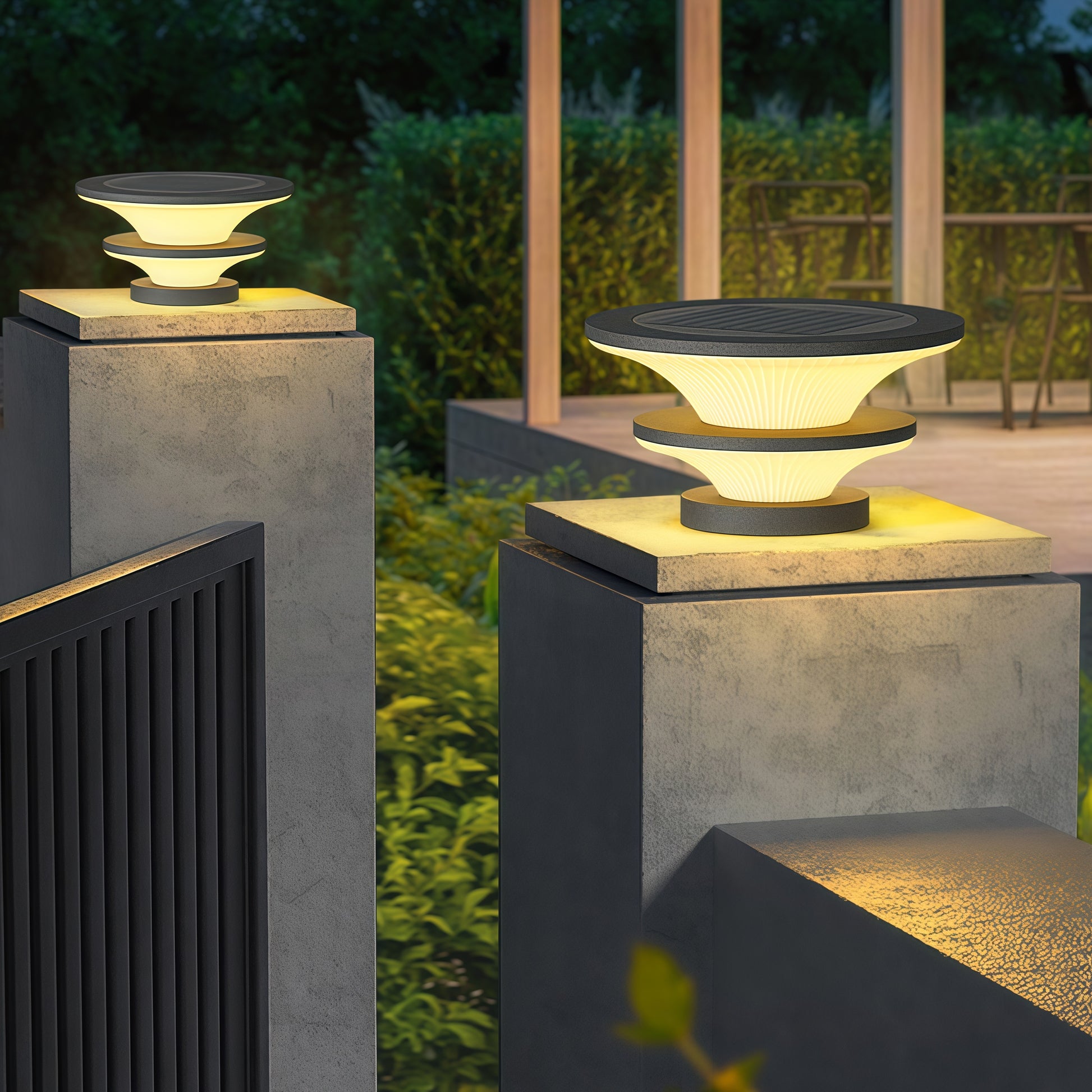 Modern concrete patio pillar lights with USB rechargeable table lamp functionality creating outdoor ambiance