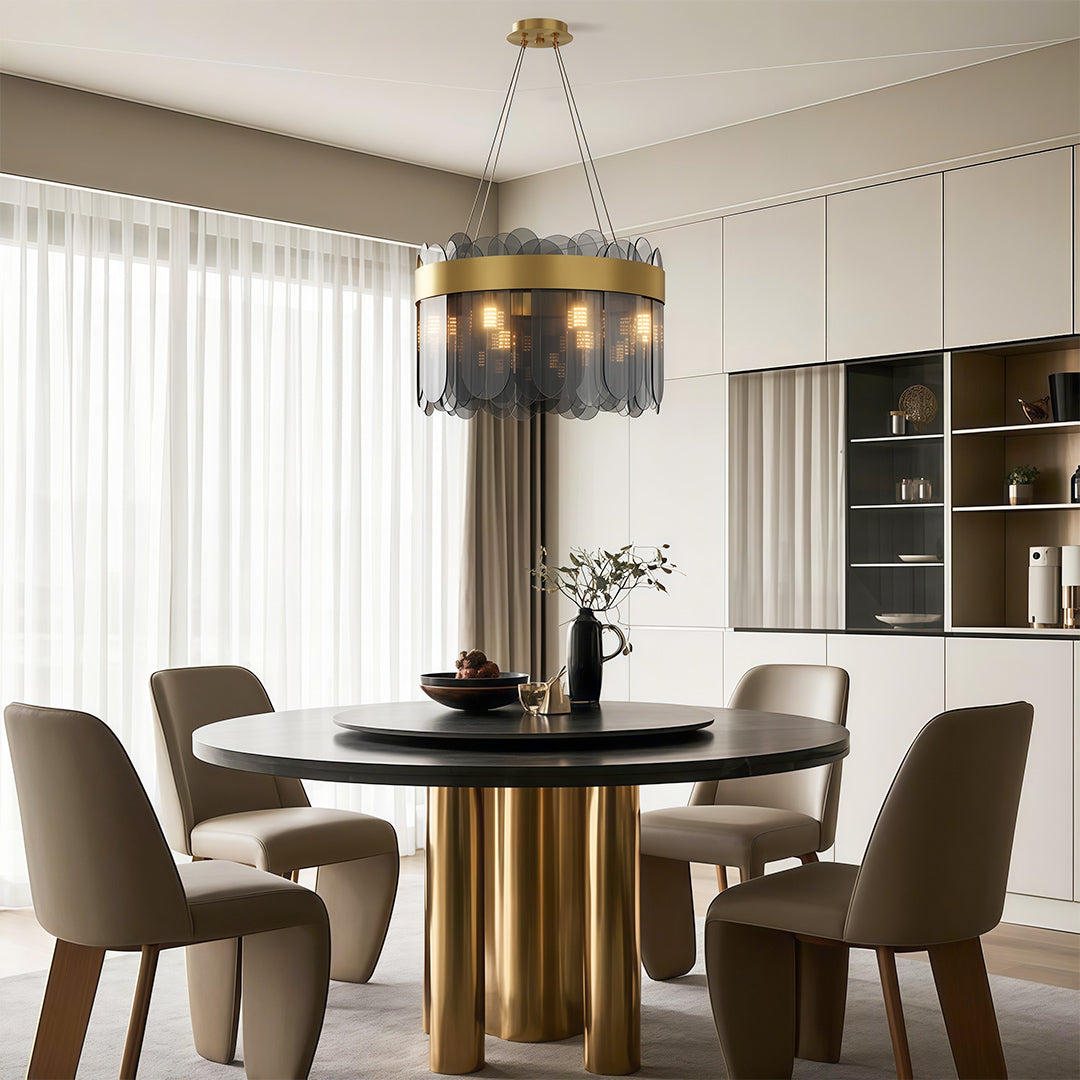 Modern luxury chandeliers lighting contemporary dining area with fluted table and curtains
