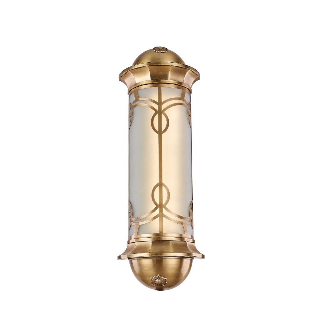 Modern copper outdoor wall sconce mounted beside a large arched window, providing warm and inviting illumination.