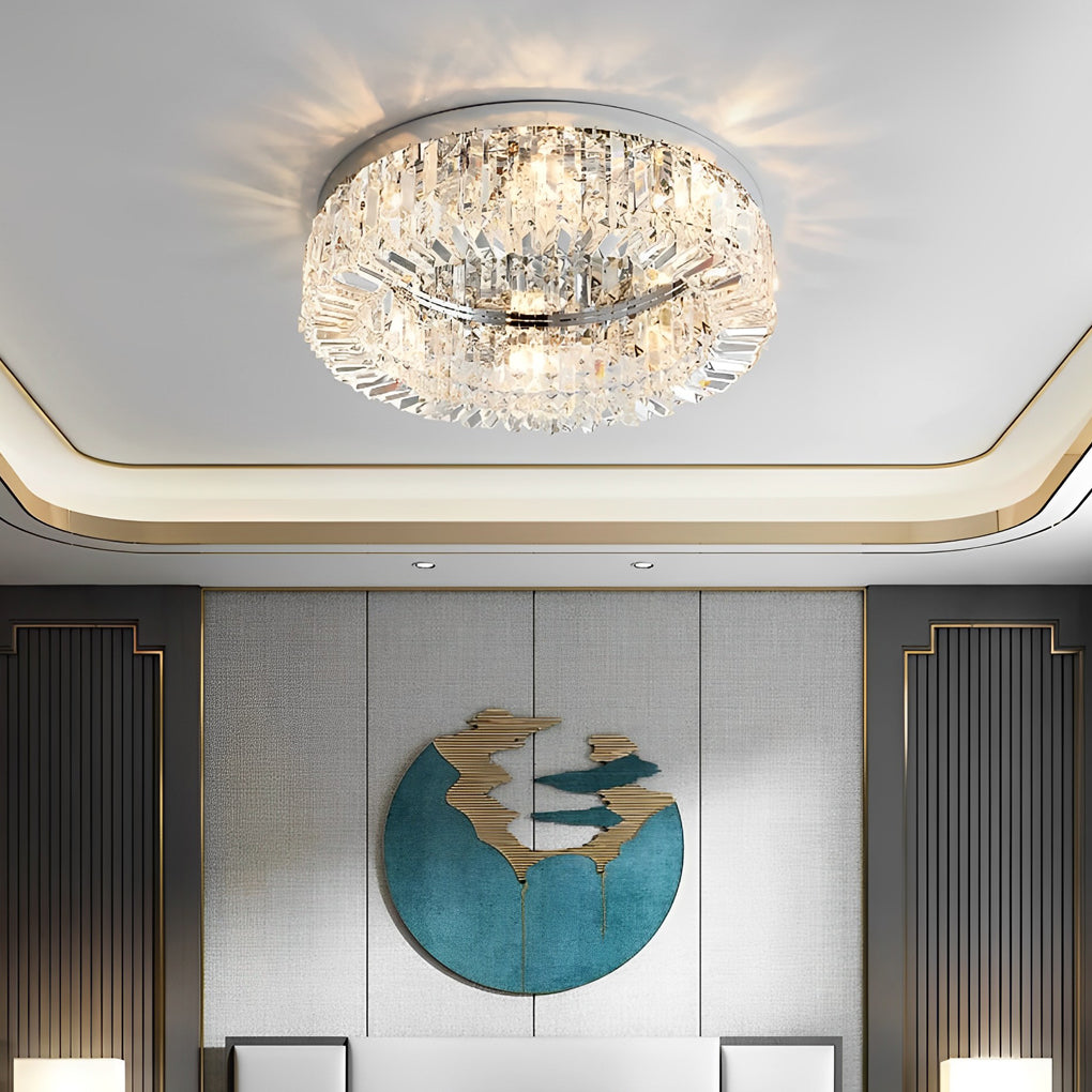 Modern crystal ceiling light installed in a minimalist living room with decorative wall art.