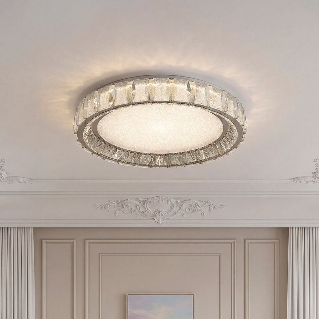 Stunning modern crystal flush mount lighting with a silver crystal ring and a textured center.