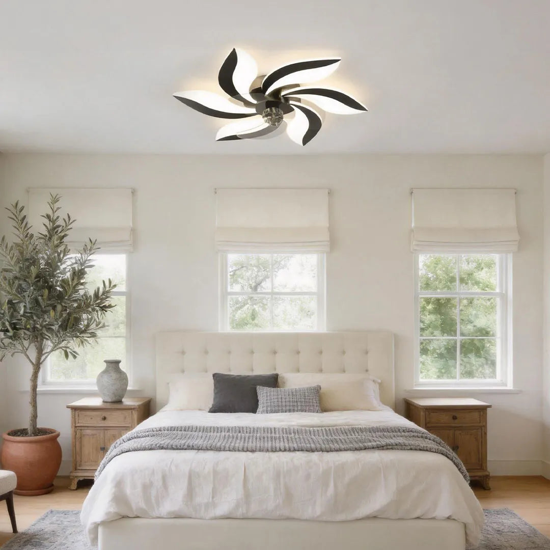 Decorative ceiling fans with lights featuring curved blades, integrated LED lighting, and a stylish modern ceiling design.