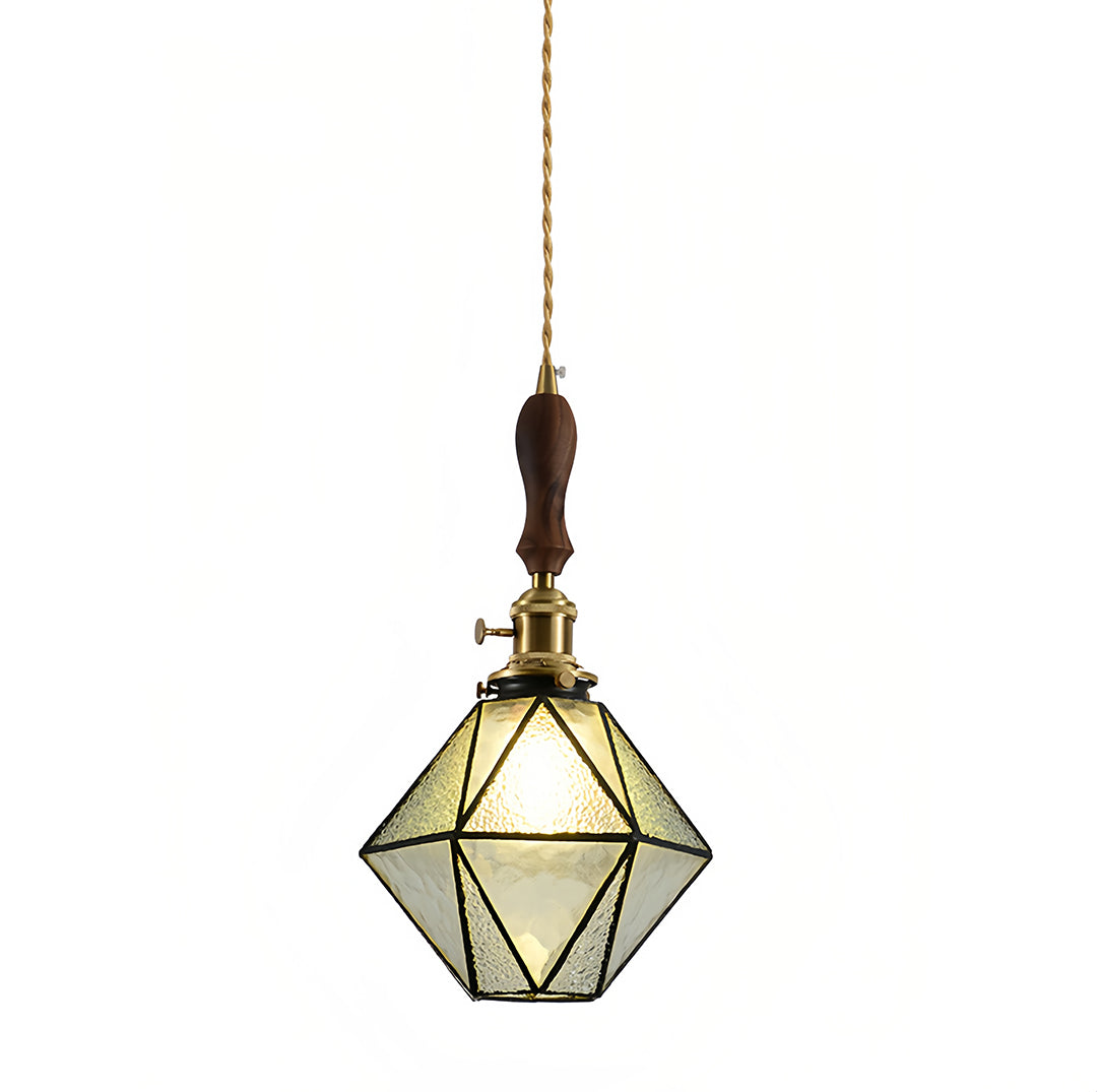 Modern diamond-shaped pendant light featuring clear glass geometric design and antique brass finish hardware