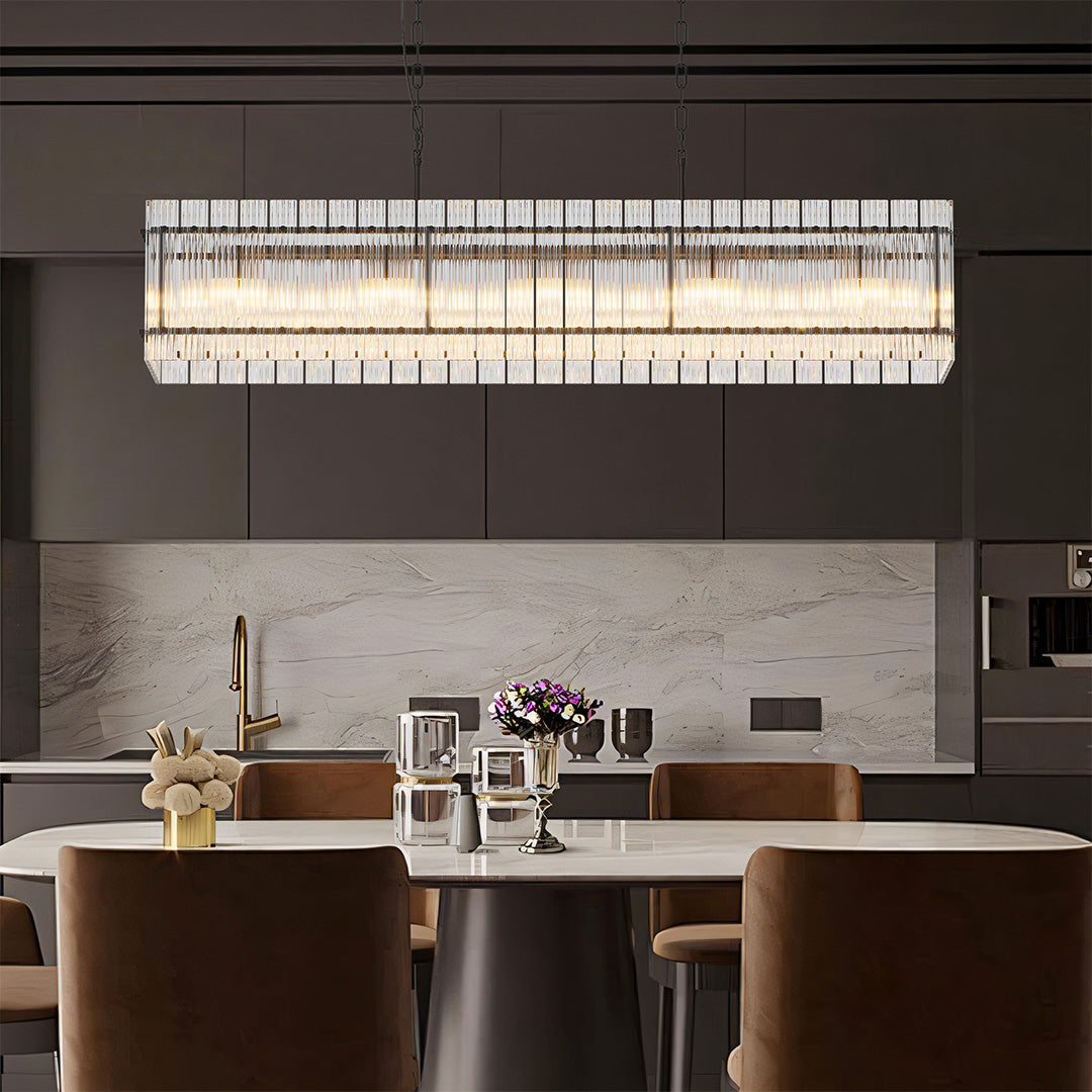 Contemporary glass lamp shade chandelier suspended above a dining table, blending luxury with simplicity.