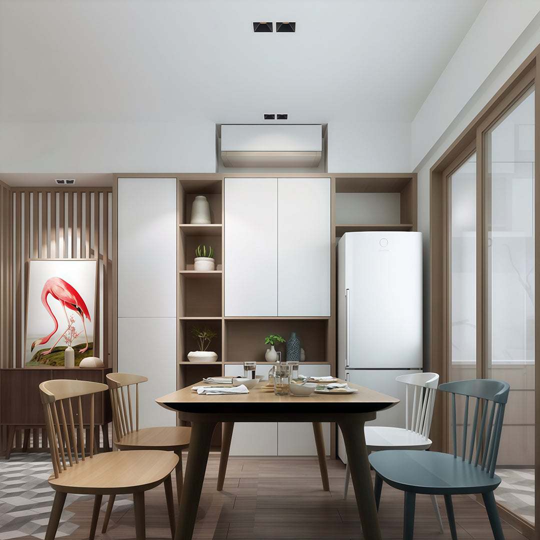 Modern dining room scene with black recessed square led downlights illuminating the table and white cabinets.