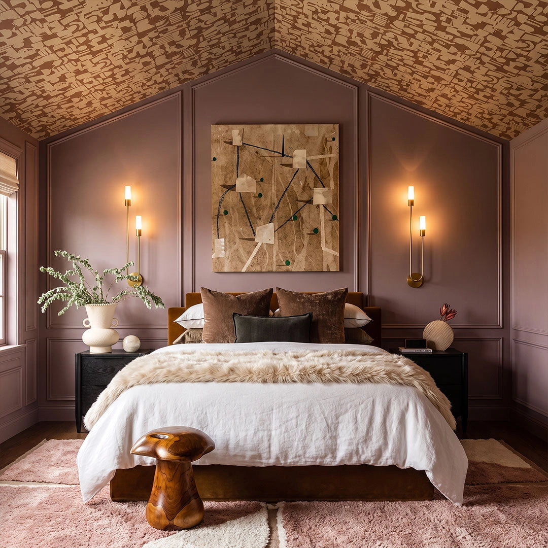Modern double heads wall sconce installed on both sides of a bedroom bed, showcasing a sleek vertical design and soft ambient glow.