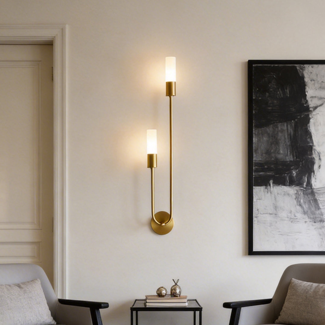 Modern double heads wall sconce with a sleek black and gold design, enhancing a contemporary hallway.
