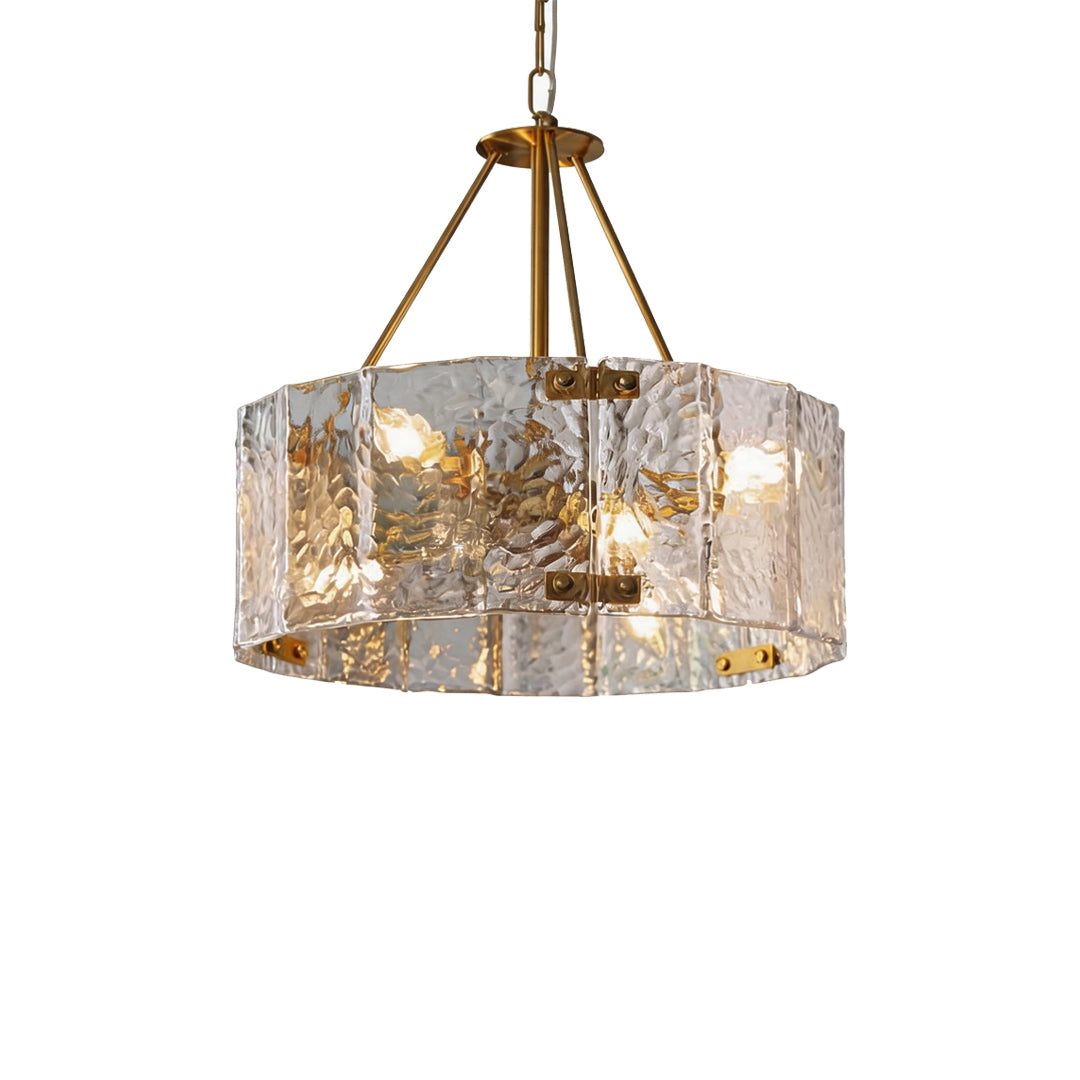 Modern drum chandelier compact round version with textured crystal-style glass and brass finish.