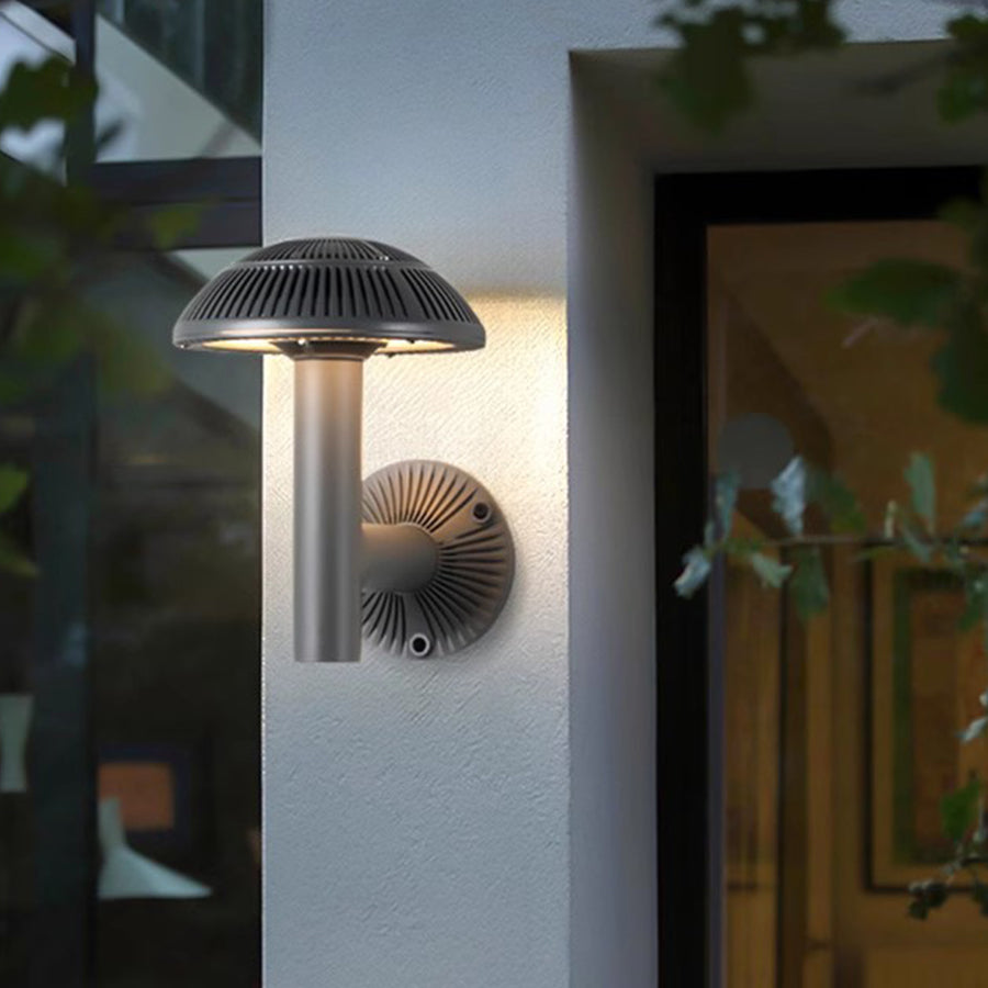 Modern entrance lighting featuring sleek bollard lights beside contemporary architectural elements