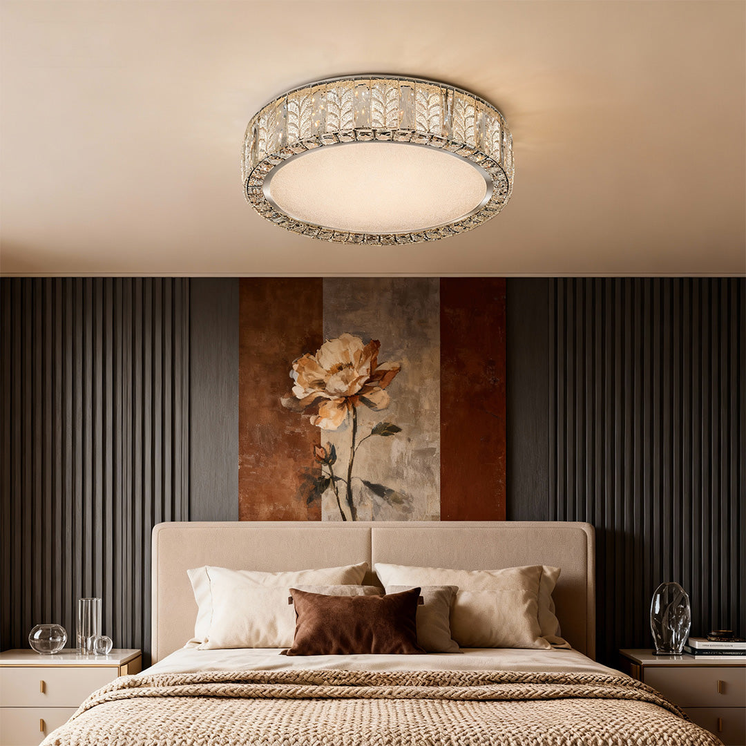 Modern flush mount ceiling light with crystal details and a sleek round design, perfect for contemporary interiors.