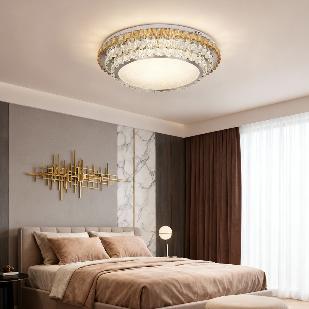 Modern flush mount light in a bedroom with a gray and white color scheme, providing a soft and elegant glow.