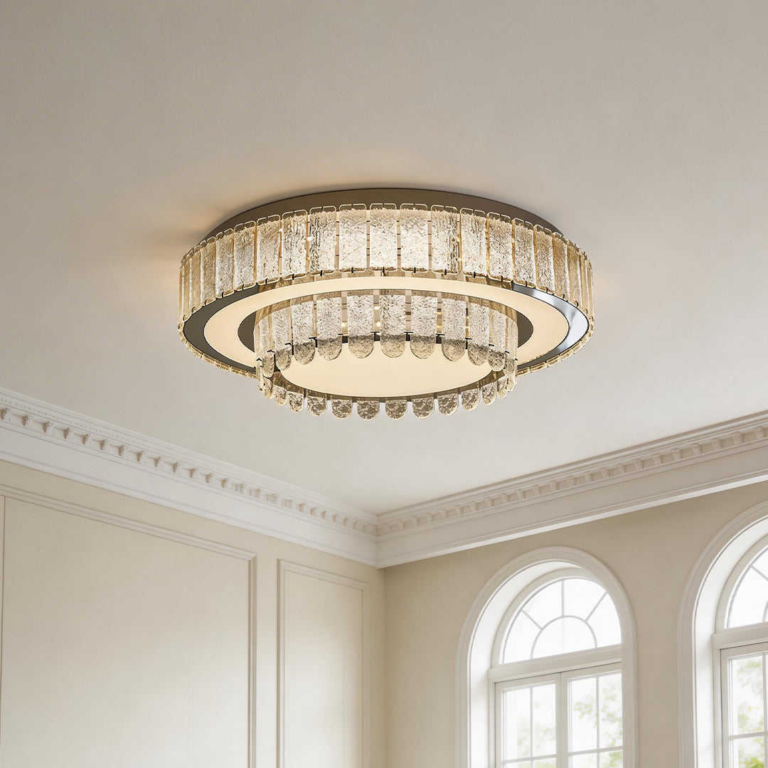 Luxury modern flush mount light fixtures with a double tiered gold frame and textured crystals.