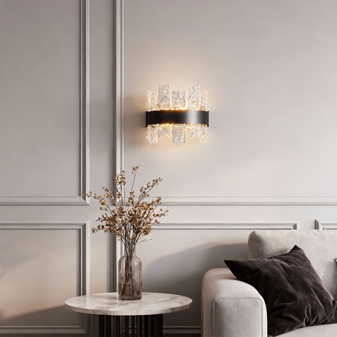 Modern luxury chandeliers enhancing minimalist living room with grey sofa and marble table