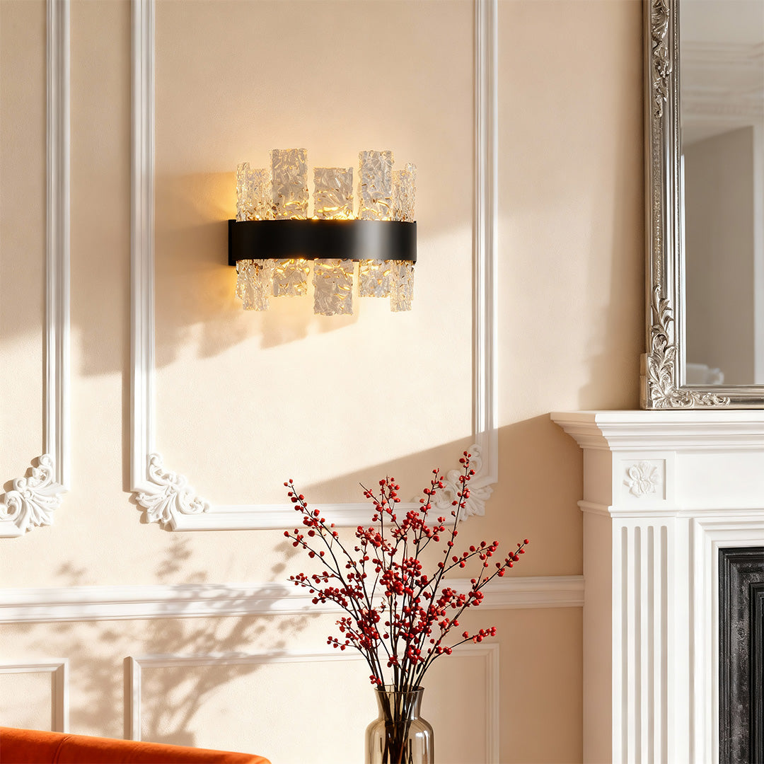 Modern luxury chandeliers creating warm glow in sophisticated white hallway setting