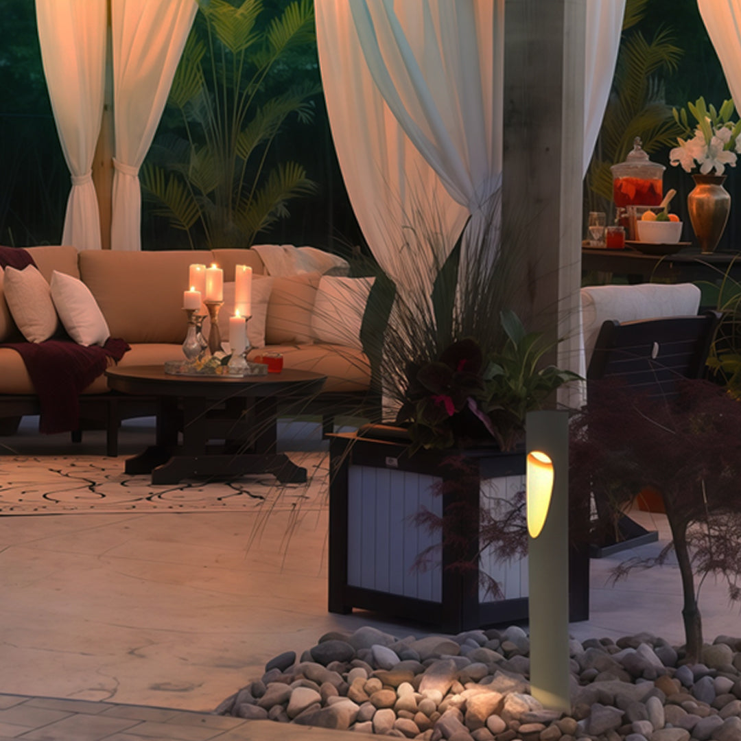 Modern garden space with installed garden bollard led lights softly highlighting greenery and pathway edges.