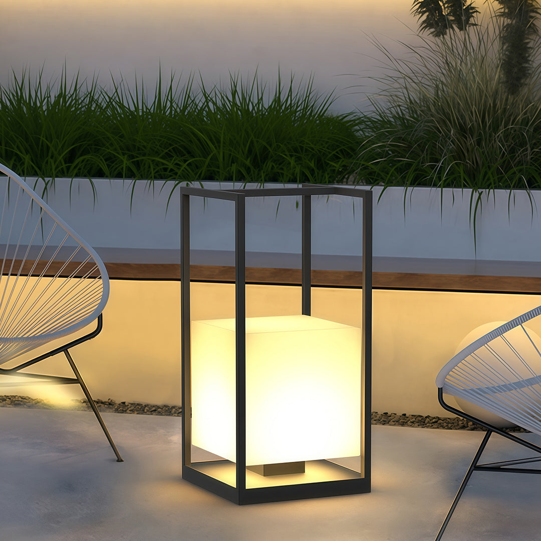 Contemporary outdoor lantern showcasing a black frame and frosted glass, ideal for modern garden decor.