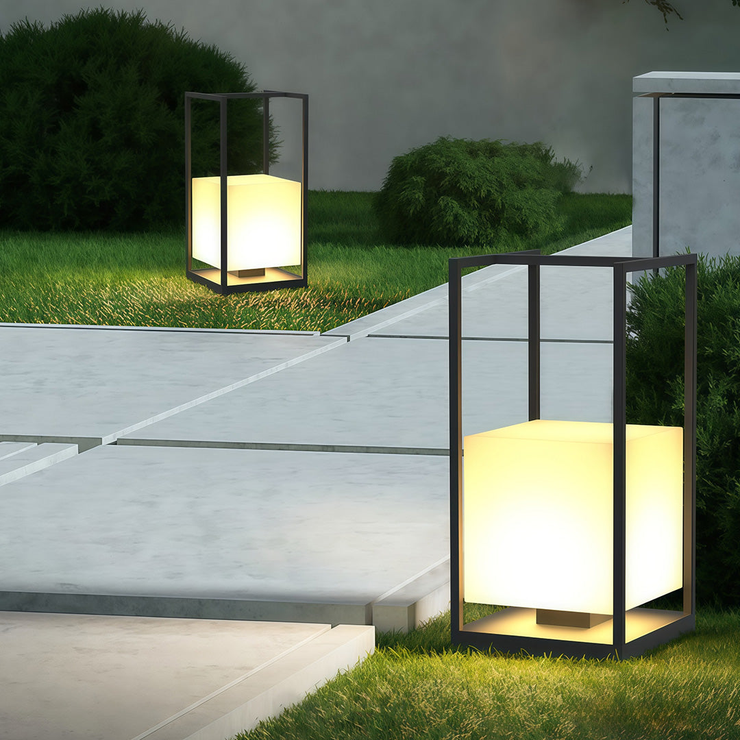 Contemporary outdoor lantern showcasing a black frame and frosted glass, ideal for modern garden decor.