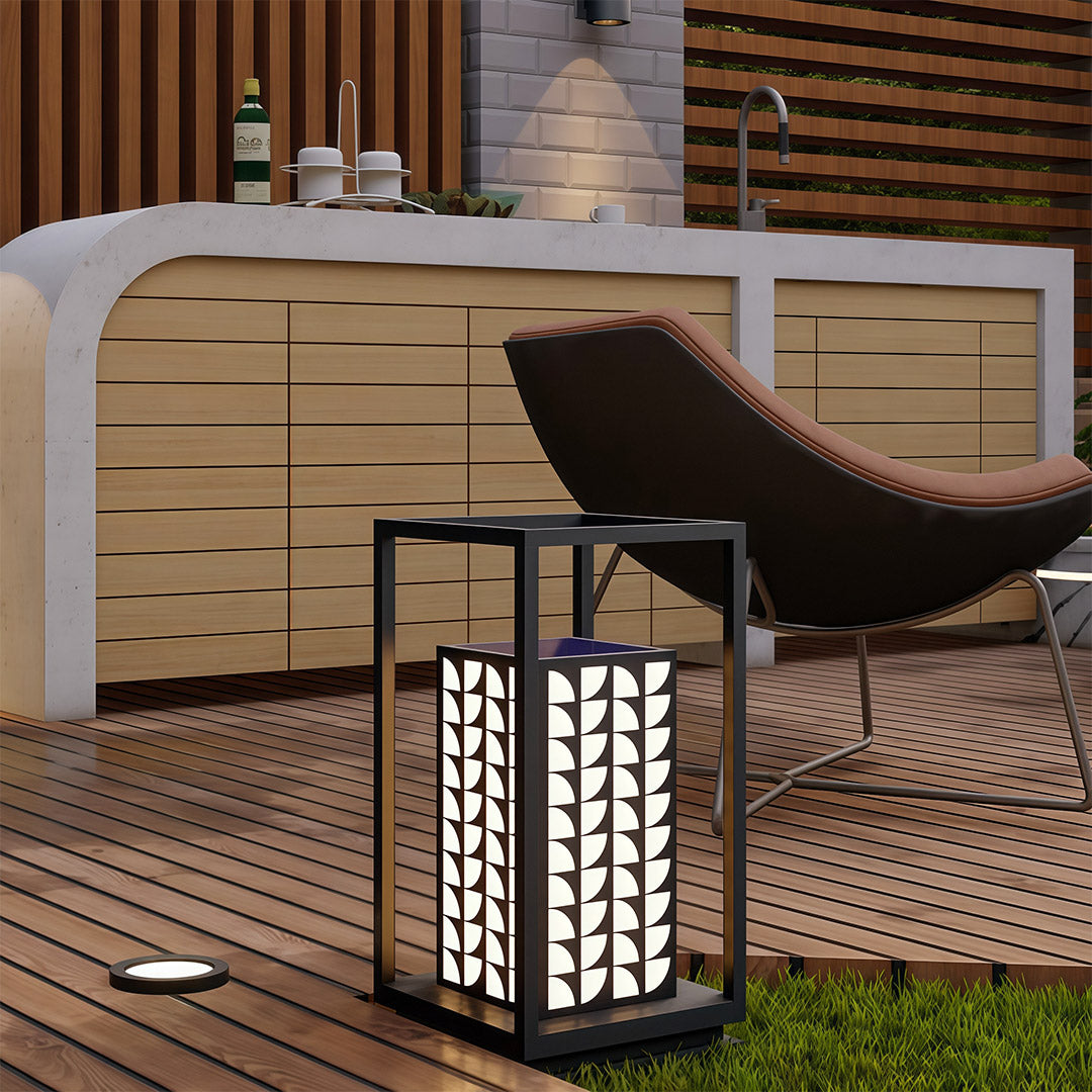 Outdoor LED bollard light illuminating a modern garden space, enhancing both beauty and function.