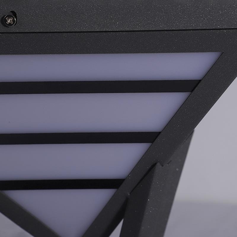 Modern gate pillar light shade detail showing layered diffuser design.