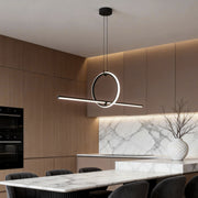Modern geometric pendant light fixture with a circular design, hanging above a kitchen island in a contemporary home.