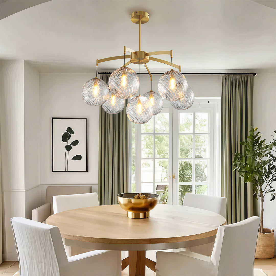 black modern glass ball chandelier in a minimalist living room with neutral decor