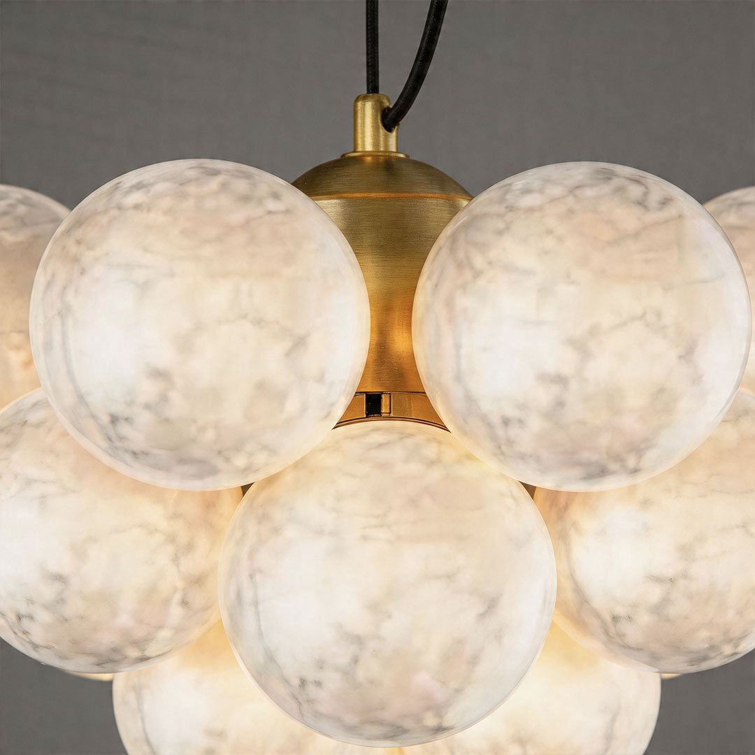 Close-up of frosted glass bubble globes showing textured surface and warm light.