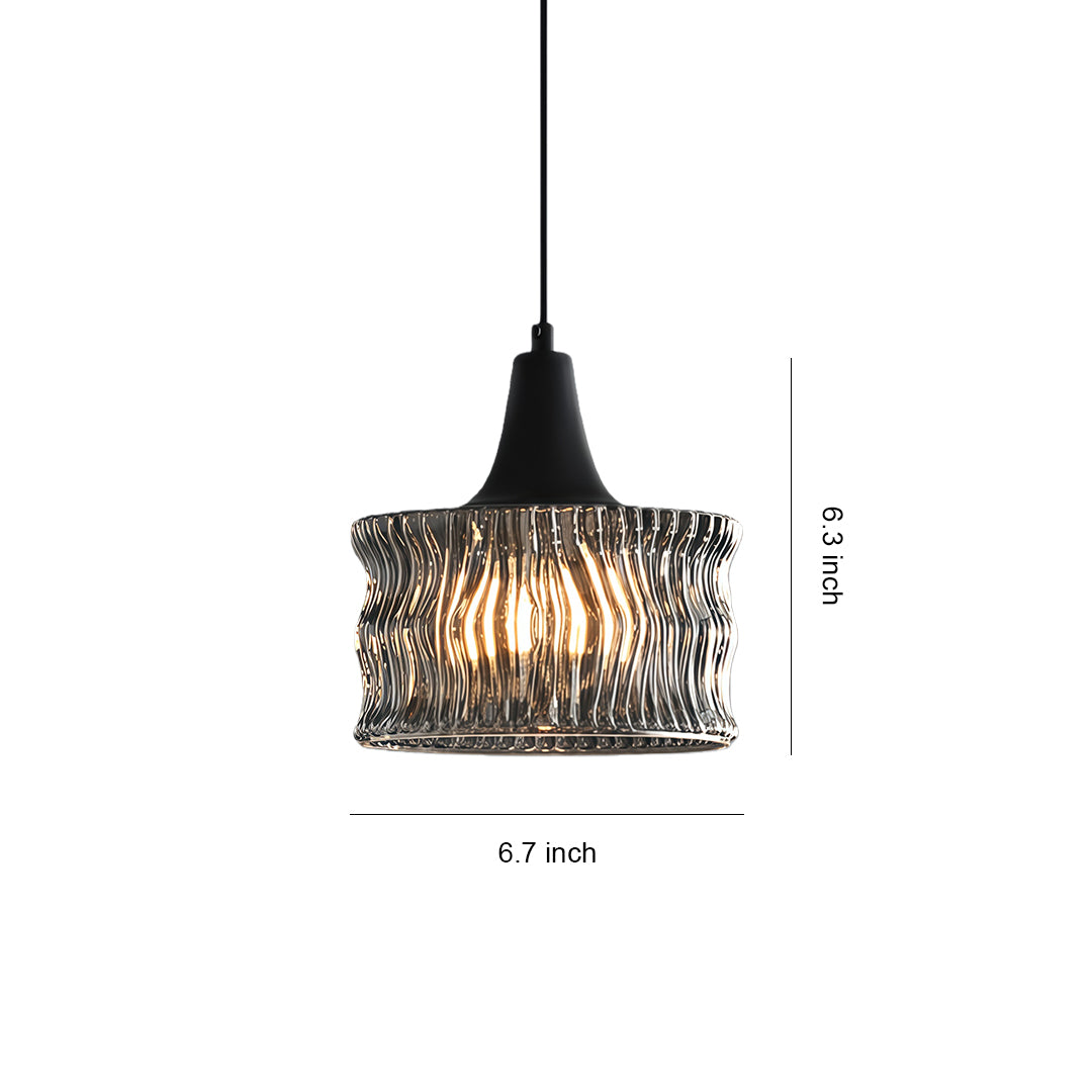 Modern glass drum pendant light with a black metal frame, showcasing a textured glass design.