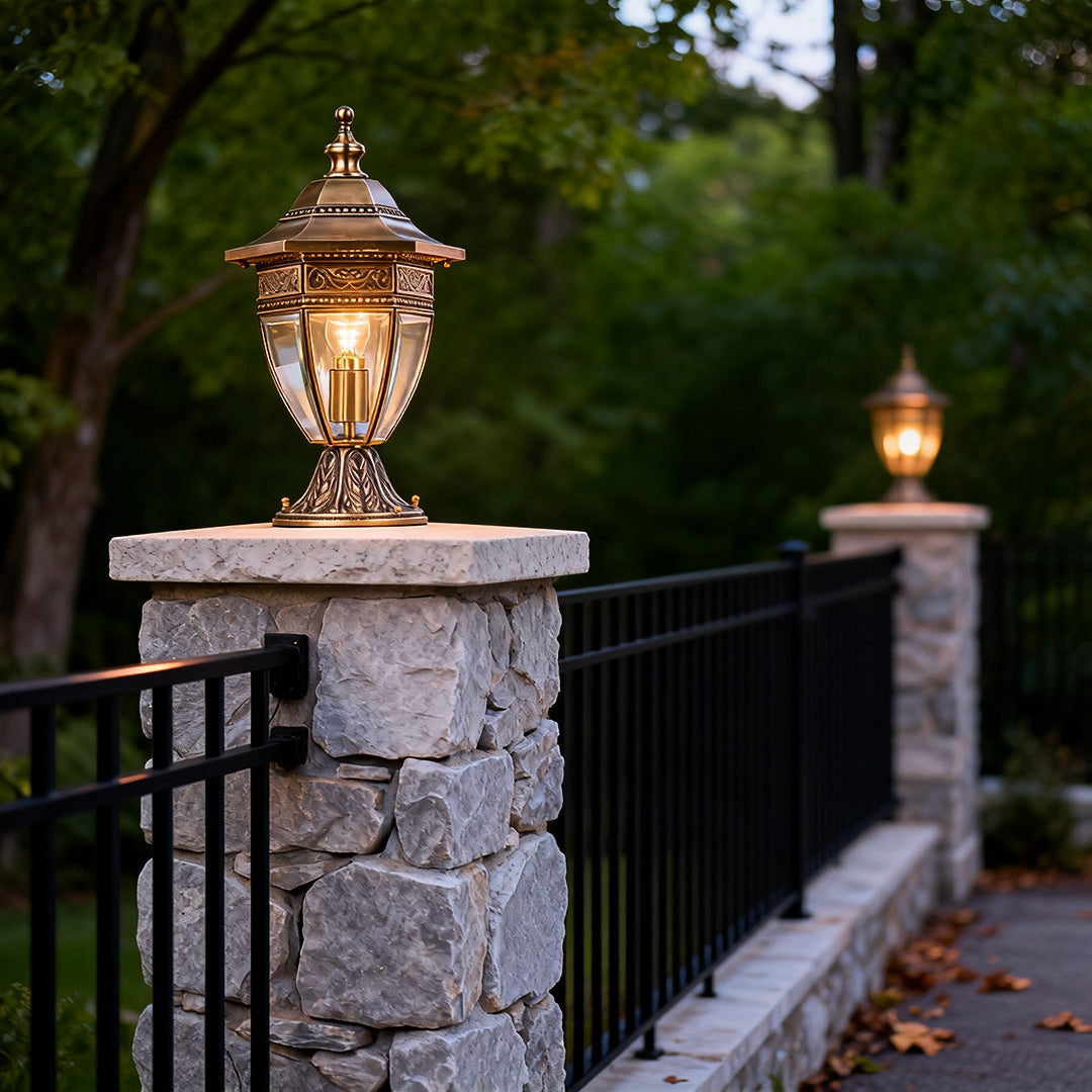 Modern glass pillar light on a brick pillar, offering soft and elegant lighting for driveways and garden entrances.