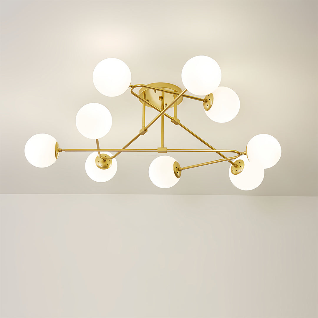 Modern gold semi flush mount light with branching design creating dramatic ceiling lighting focal point