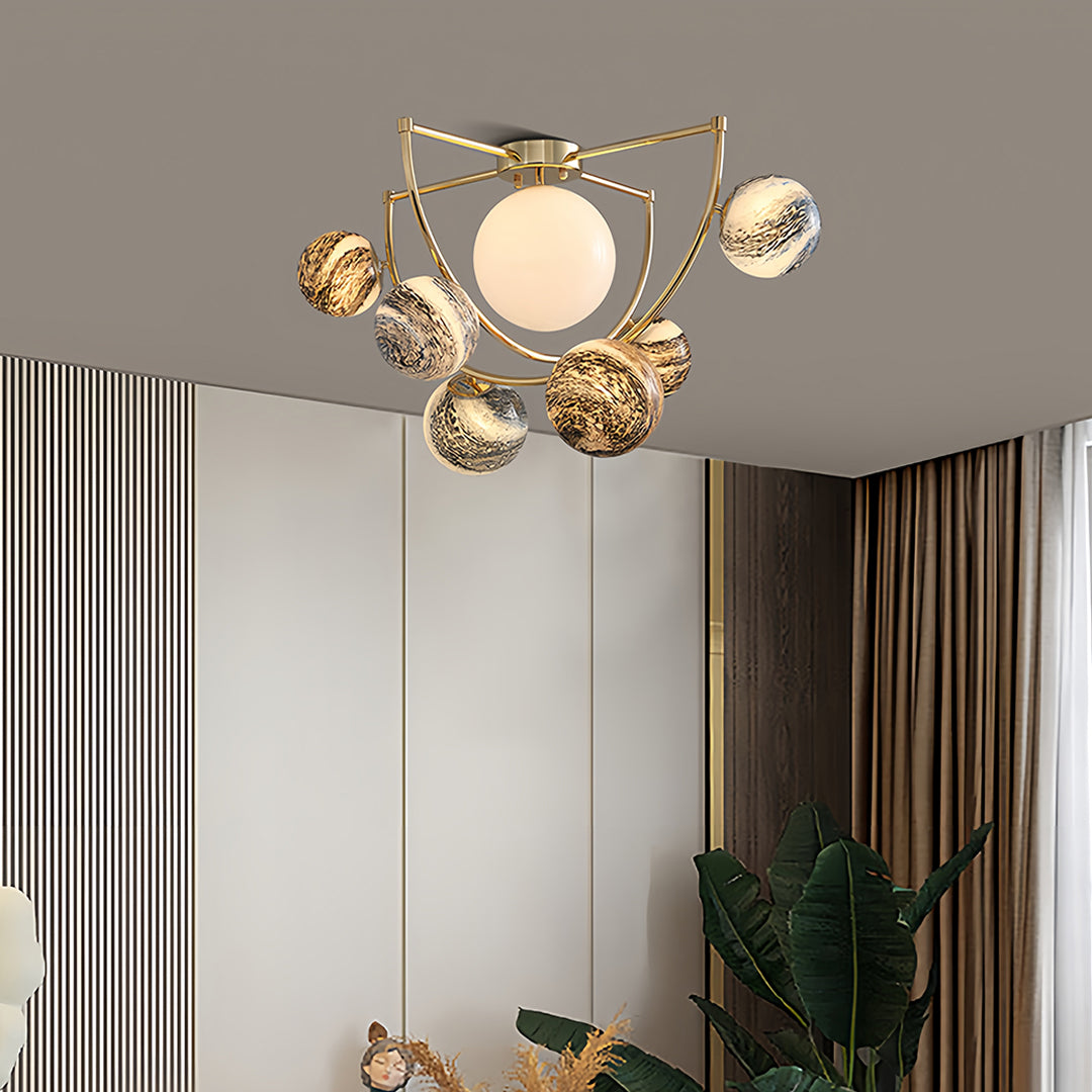 Modern gold semi flush ceiling light creating architectural interest in contemporary interior with vertical elements