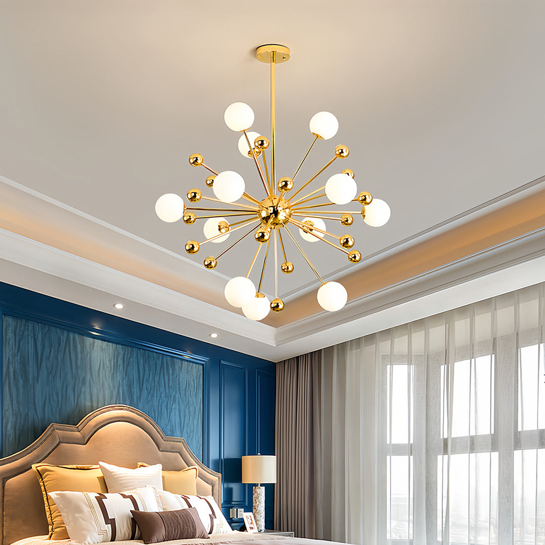 Modern gold sputnik chandelier with a single large white globe light