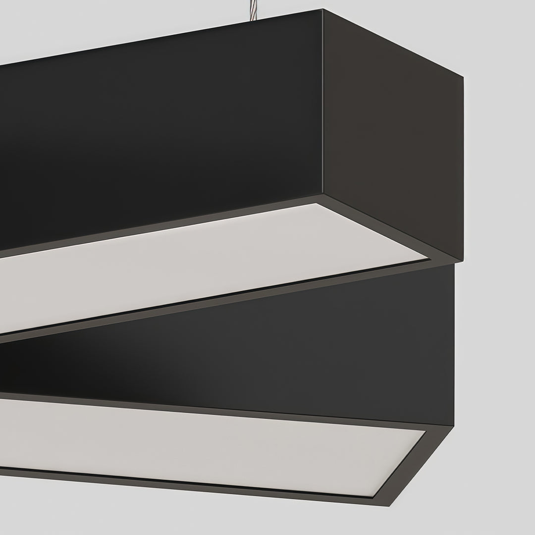 Close-up detail of a modern industrial chandelier showing layered black metal housing with integrated LED light panels.