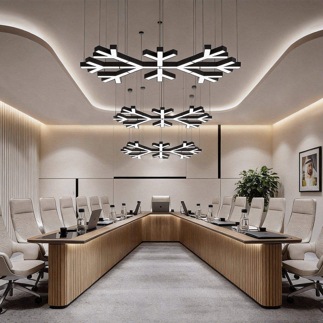 Modern industrial chandelier installed in a contemporary conference room, featuring geometric LED branches that create a bold and professional lighting focus.