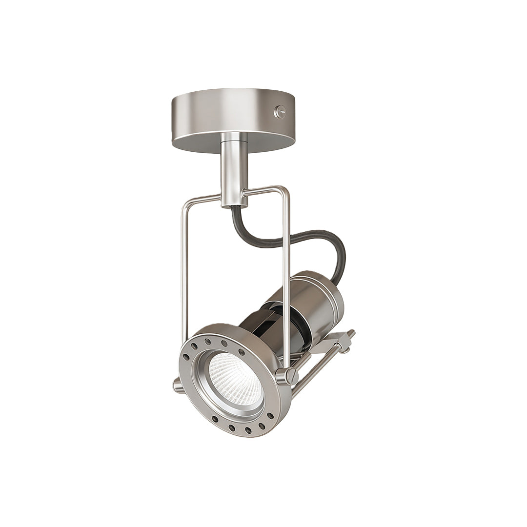 Modern industrial wall lights featuring directional spot design with protective metal cage and swivel mount