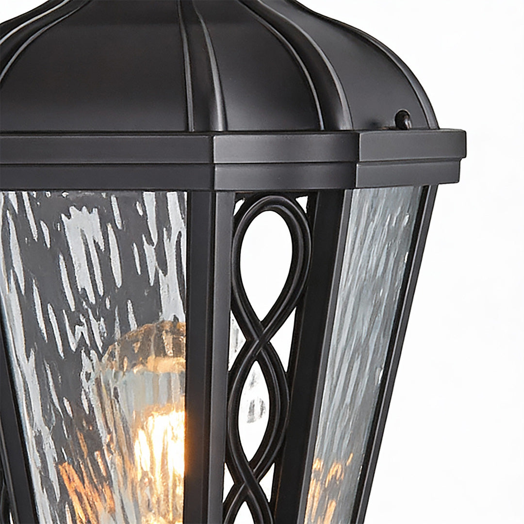Modern post lights outdoor featuring infinity-patterned glass and black frame, ideal for stylish driveway or pathway lighting.