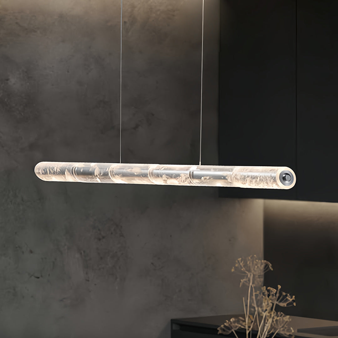 Elegant crystal pendant lights for kitchen island suspended over modern kitchen creating sophisticated ambient illumination