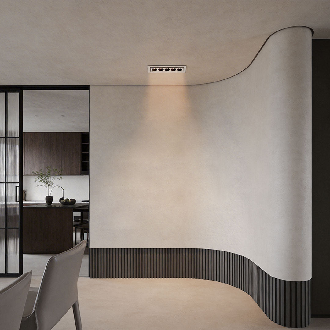 Modern kitchen with led ceiling recessed spotlights offering focused illumination on the counter.