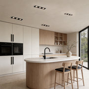 Modern kitchen interior with minimalist design and led spotlight indoor illuminating countertops.