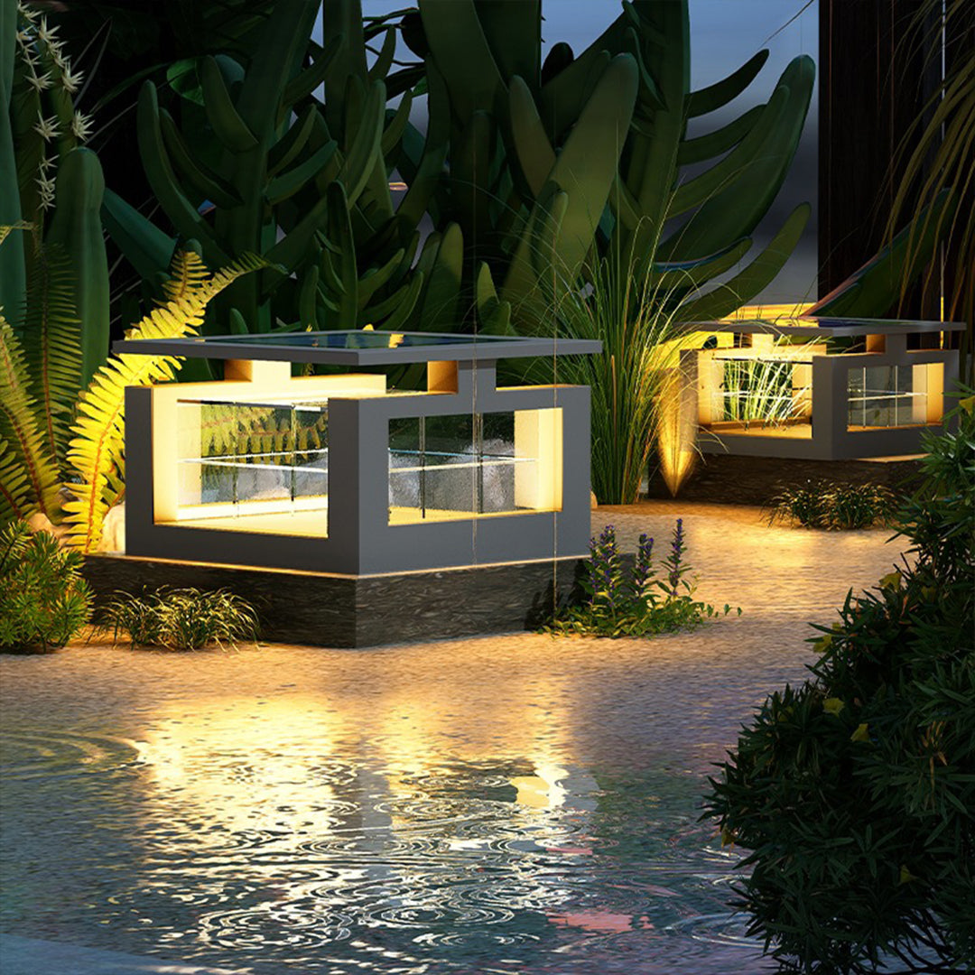 Modern landscape lighting featuring cubic fixtures with warm LED creating inviting atmosphere in residential garden setting