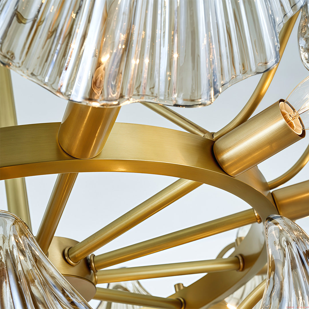 Modern large chandeliers detail view highlighting intricate brass arms and textured glass craftsmanship