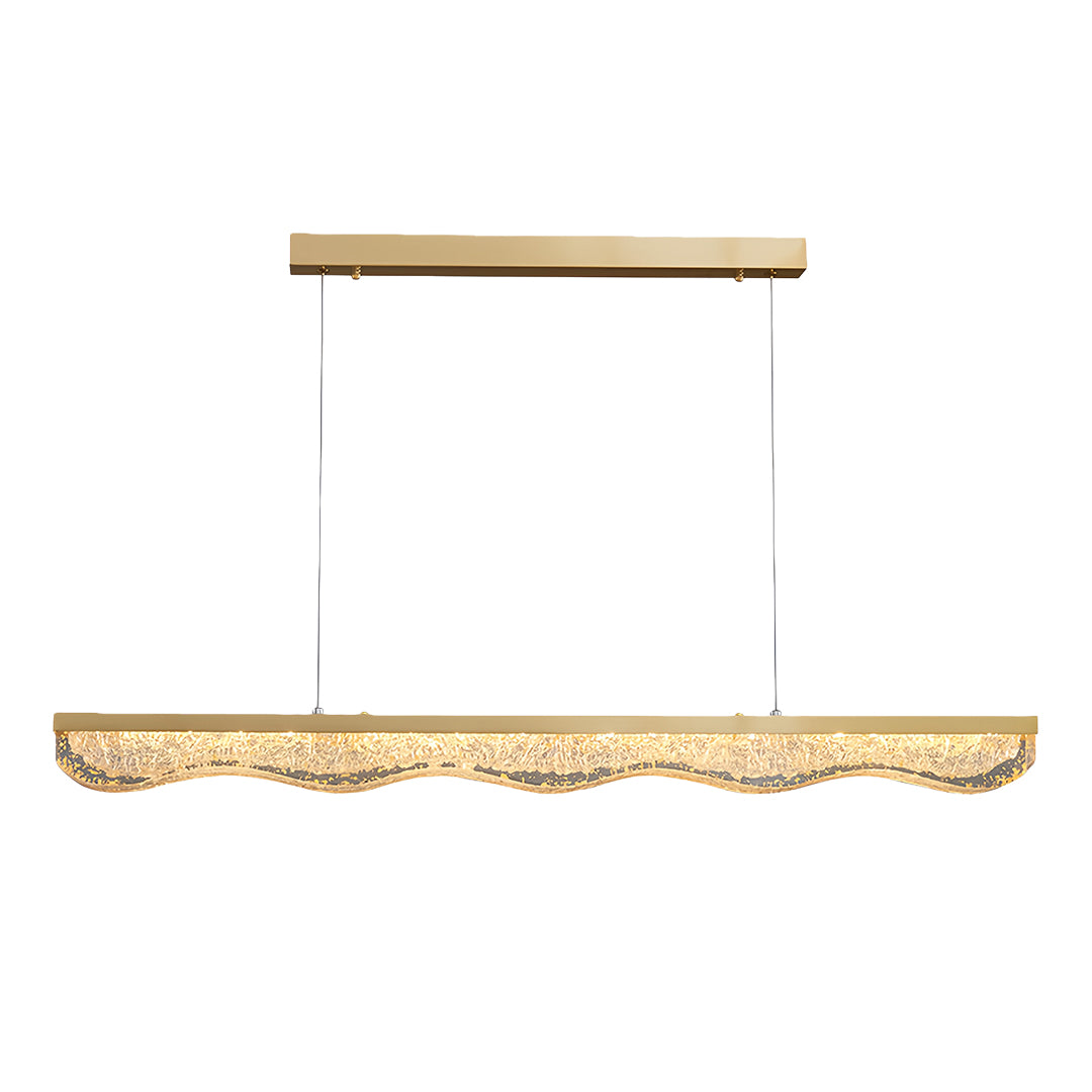 Modern large gold pendant light featuring elongated rectangular design with rippled glass and gold canopy