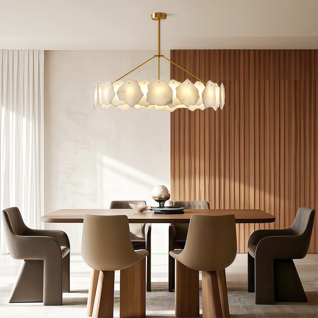 Luxury modern LED chandelier detail showcasing brass mounting and translucent glass panel assembly.