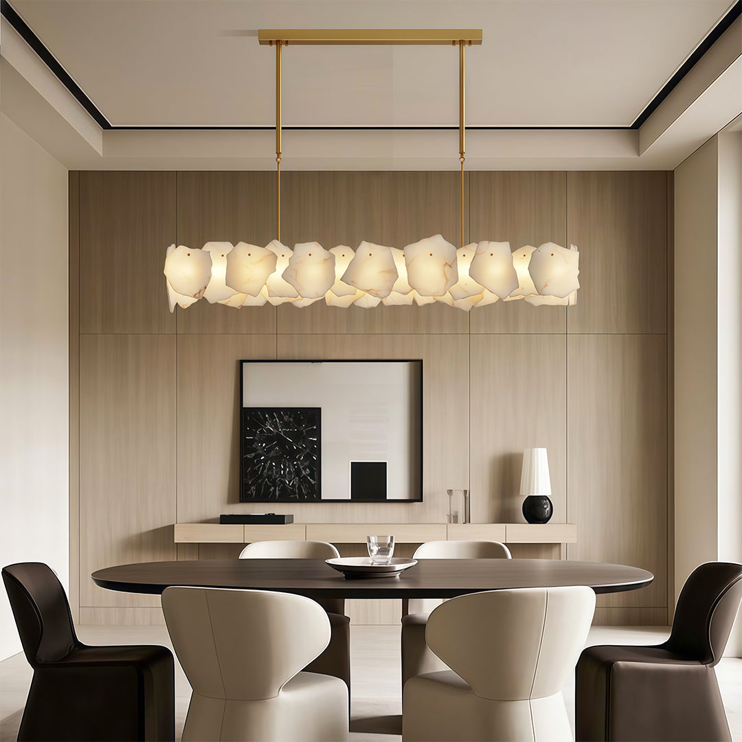 Modern LED chandelier enhancing modern dining room with geometric rug and statement lighting.