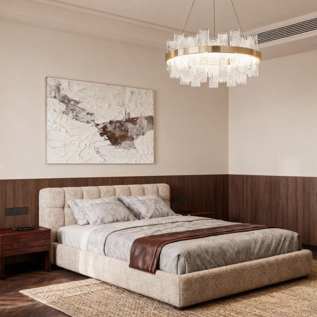 Modern led lighting chandelier suspended above bed in contemporary bedroom with two-tone walls and modern furnishings