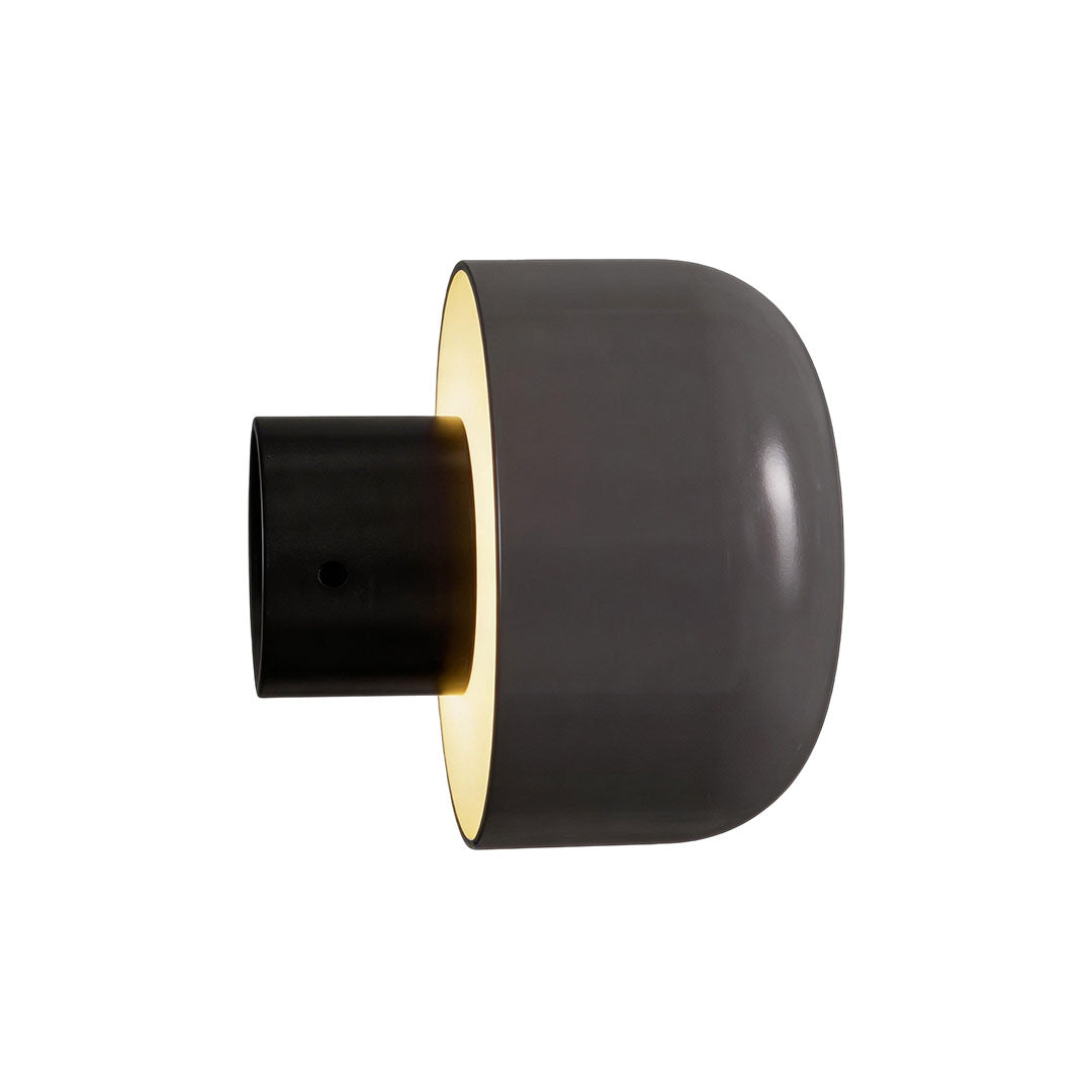 Modern LED outdoor wall light with a brown finish and illuminated top for exterior walls.